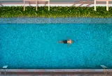 KAMAH Anjuna — the operating resort’s pool and garden (photograph)